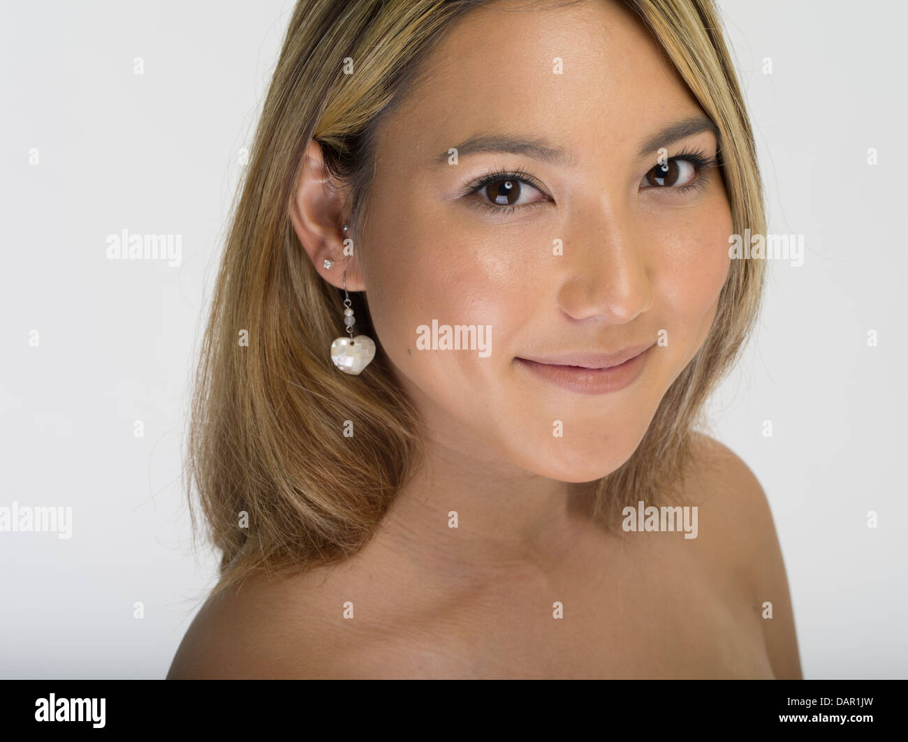 Beautiful Japanese American woman studio portrait Stock Photo