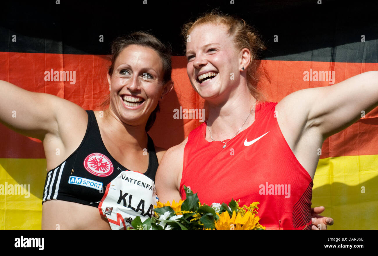German hammer throwers Kathrin Klaas (L) and Betty Heidler celebrate