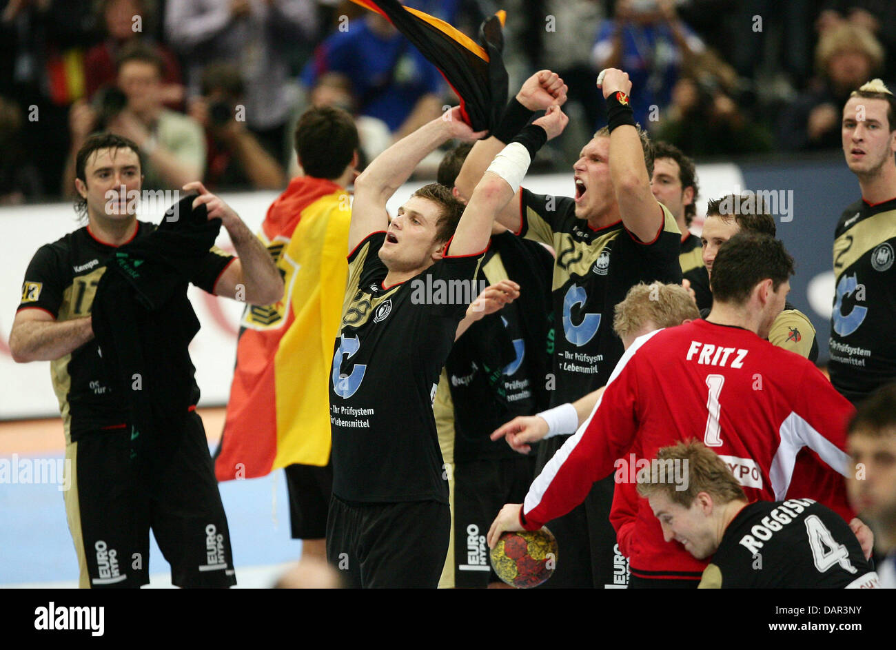 The German Players Cheer After Winning The 2007 Handball World The German Players Cheer After Winning The 2007 Handball World