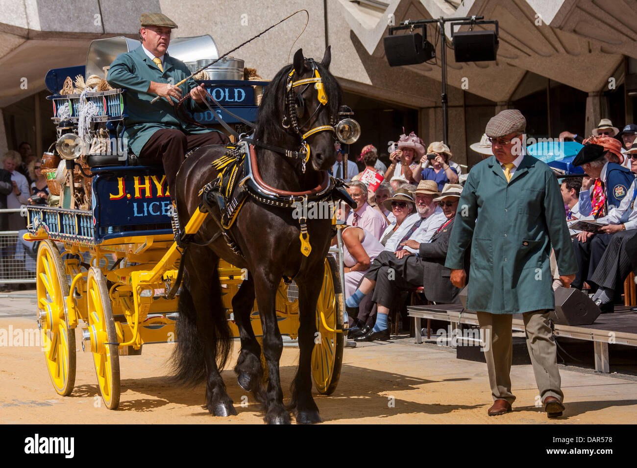 London, UK. 17th July, 2013. A 1910 Hawker's Waggon arrives at the Worshipful Company of Carmen annual Cart Marking Ceremony at Guildhall, London. Credit:  Paul Davey/Alamy Live News Stock Photo