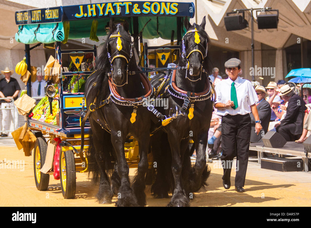 London, UK. 17th July, 2013. A 1920 greengrocer's car arrives at the Worshipful Company of Carmen annual Cart Marking Ceremony at Guildhall, London. Credit:  Paul Davey/Alamy Live News Stock Photo