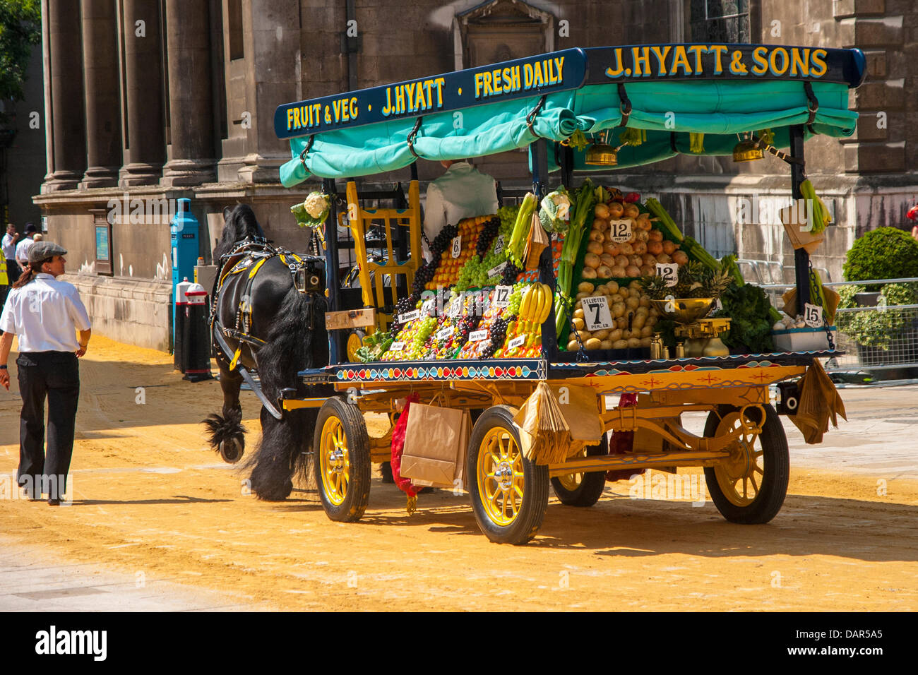 London, UK. 17th July, 2013. A horse drawn Greengrocer's Cart leaves the Worshipful Company of Carmen annual Cart Marking Ceremony at Guildhall, London. Credit:  Paul Davey/Alamy Live News Stock Photo