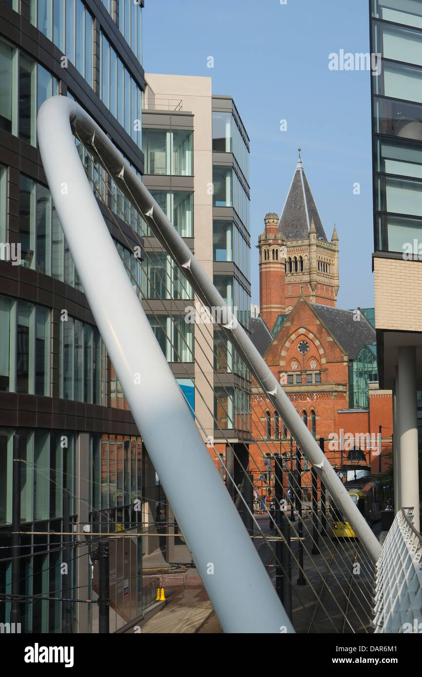 England, Manchester, detail of suspension bridge and modern office buildings Stock Photo