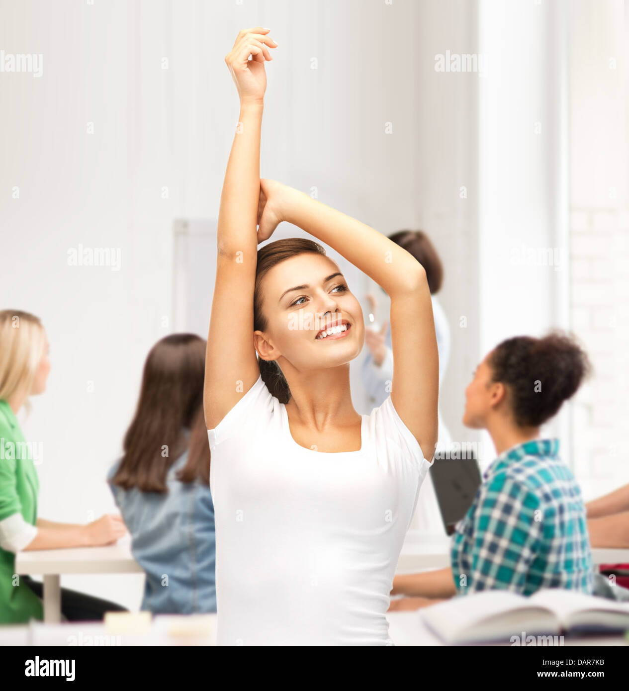 happy student girl with hands up Stock Photo - Alamy