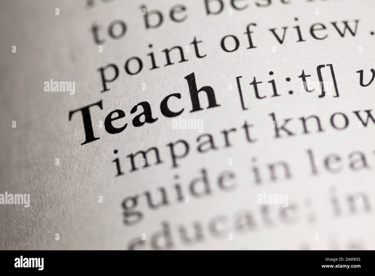 Fake Dictionary, Dictionary definition of the word Teach. Stock Photo