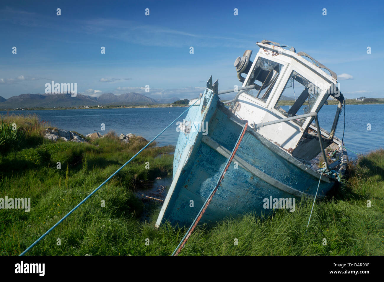 Disused fishing boat Bertraghboy Bay Roundstone Connemara County Galway Eire Republic of Ireland Stock Photo