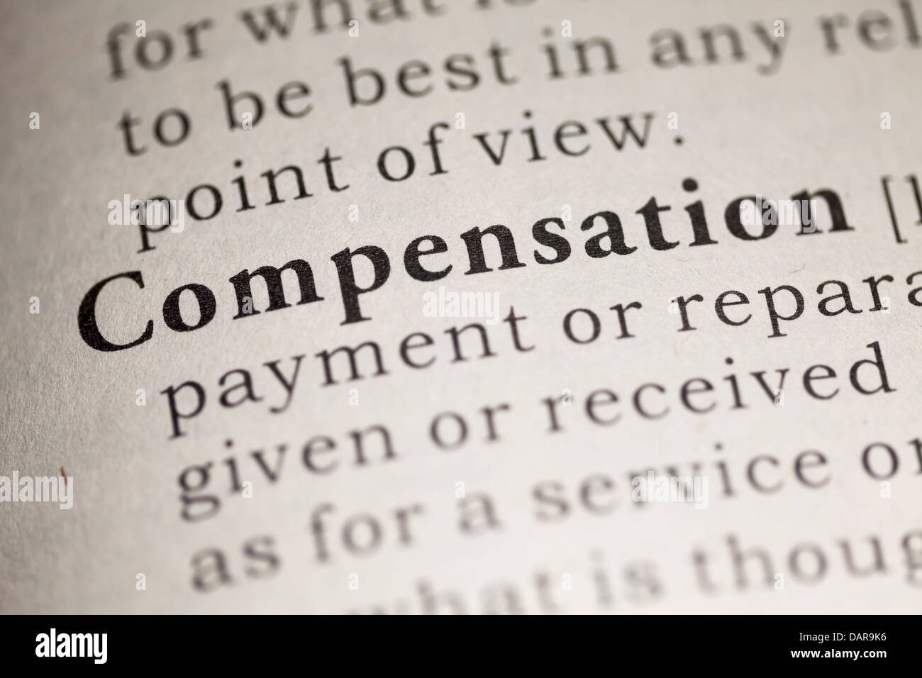 Fake Dictionary, Dictionary definition of the word Compensation. Stock Photo