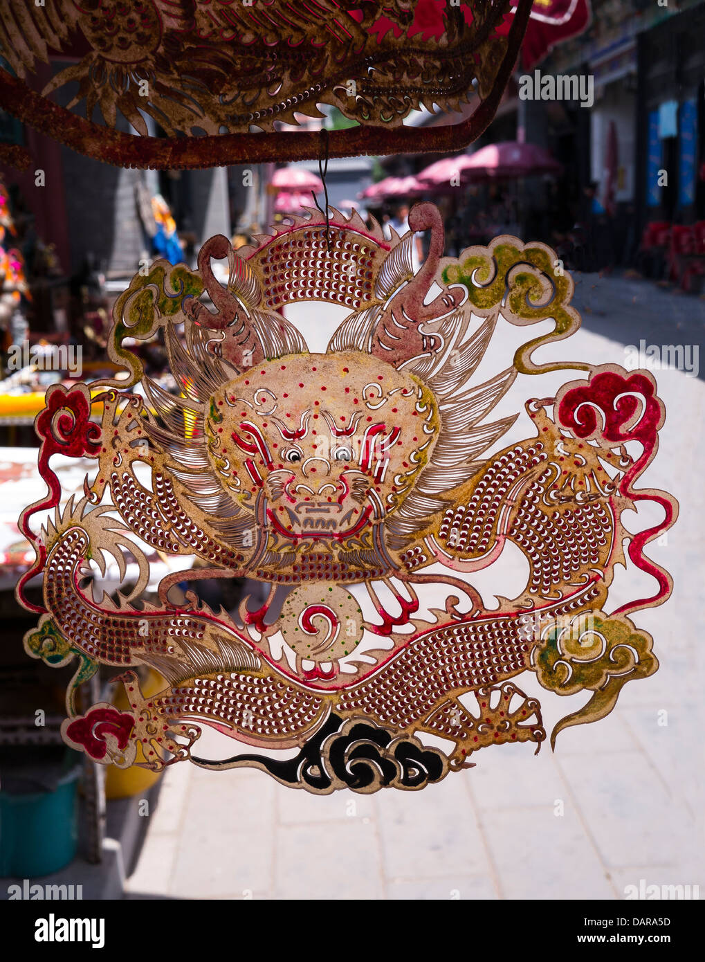 Paper-cut dragon figure. Panjiayuan Art Market. Beijing. China Stock Photo