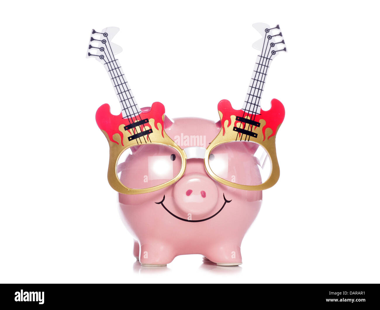 piggy bank wearing guitar glasses studio cutout Stock Photo