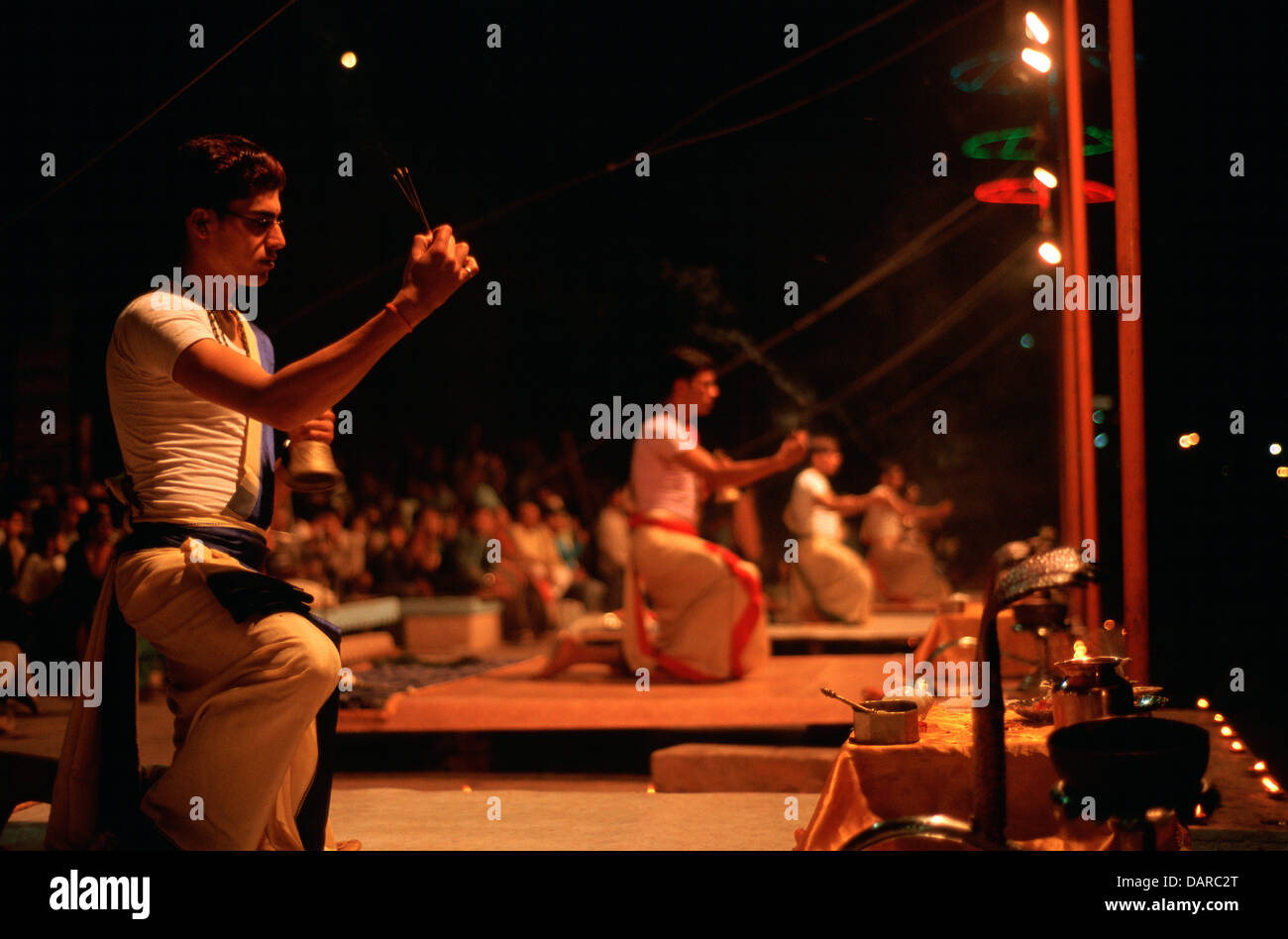 Evening ritual ( aarti) performed by brahmins on the banks of the Ganges river ( India) Stock Photo