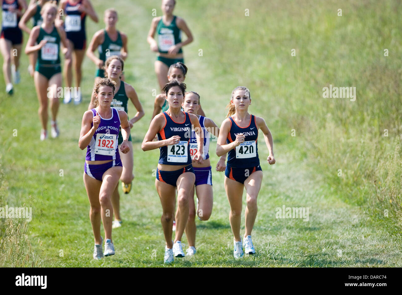 Stephanie Garcia (423) and Lauretta Dezubay (420) during the 2007 Lou Onesty Invitational Cross Country meet at Panorama Farms near Charlottesville, VA on September 7, 2007. Stock Photo