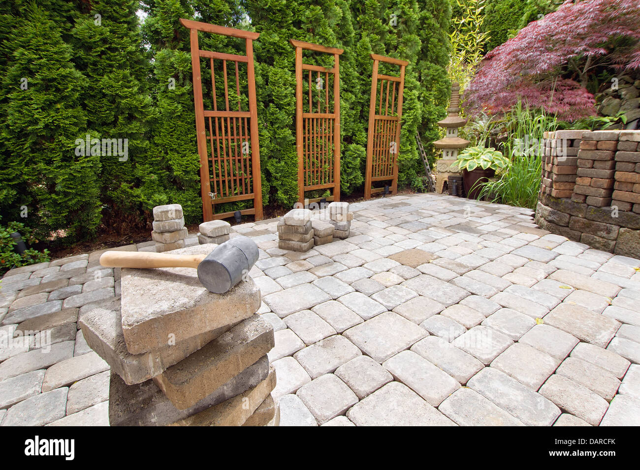 Stack of Brick Pavers for Hardscape in Backyard Landscaping with ...