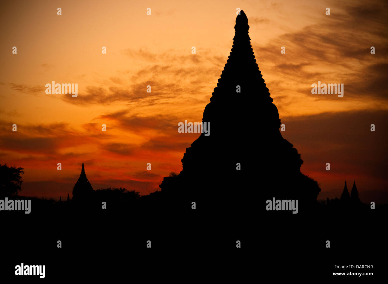 Silhouette of pagodas in Old Bagan at dusk. Stock Photo