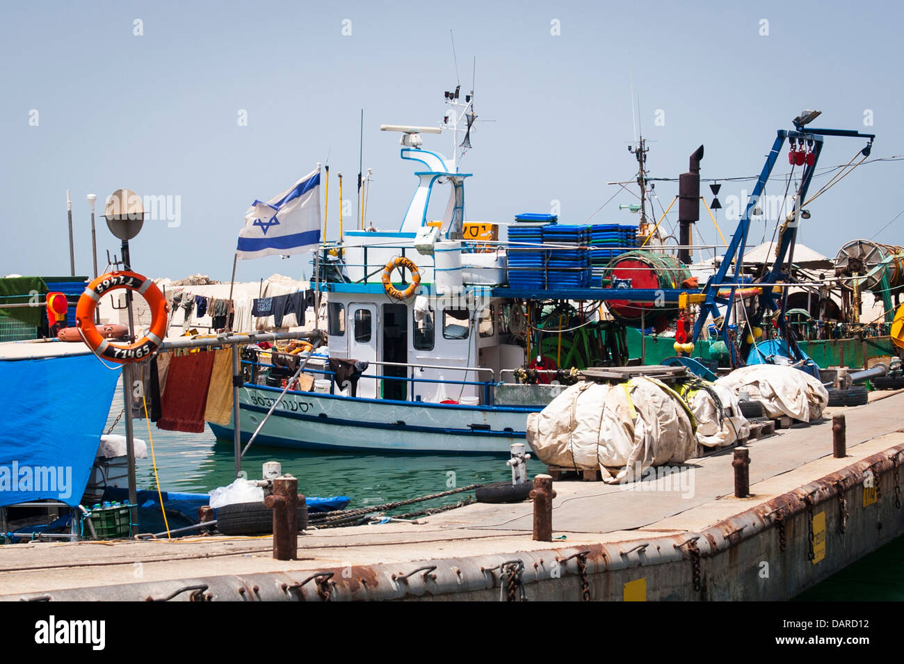 Israel , Jaffa Jafo Old City Port , harbour harbor quay quayside marina fishing boat vessel boats ship ships Israeli flag Stock Photo