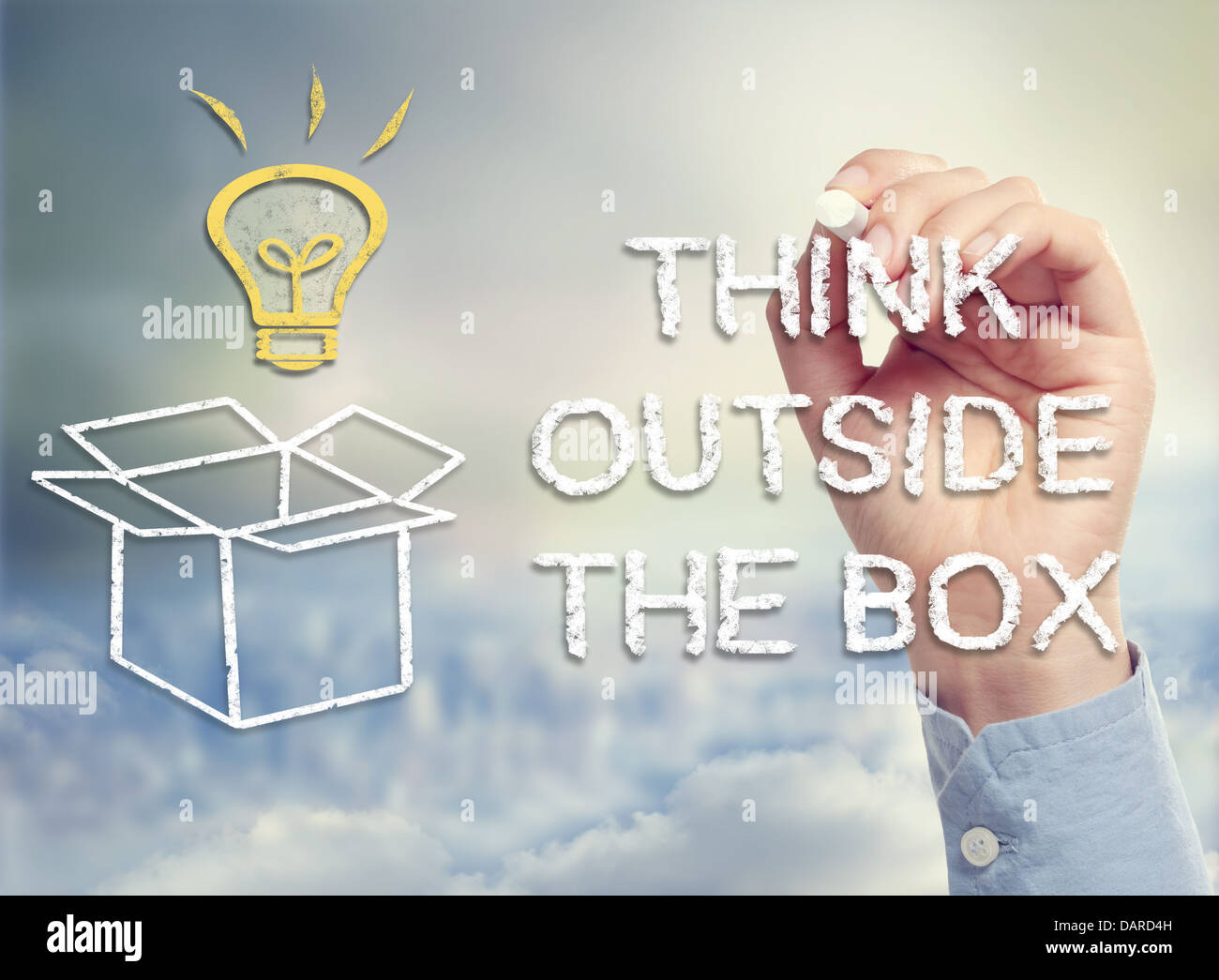Think outside the box concept with idea light bulb and open box drawing ...