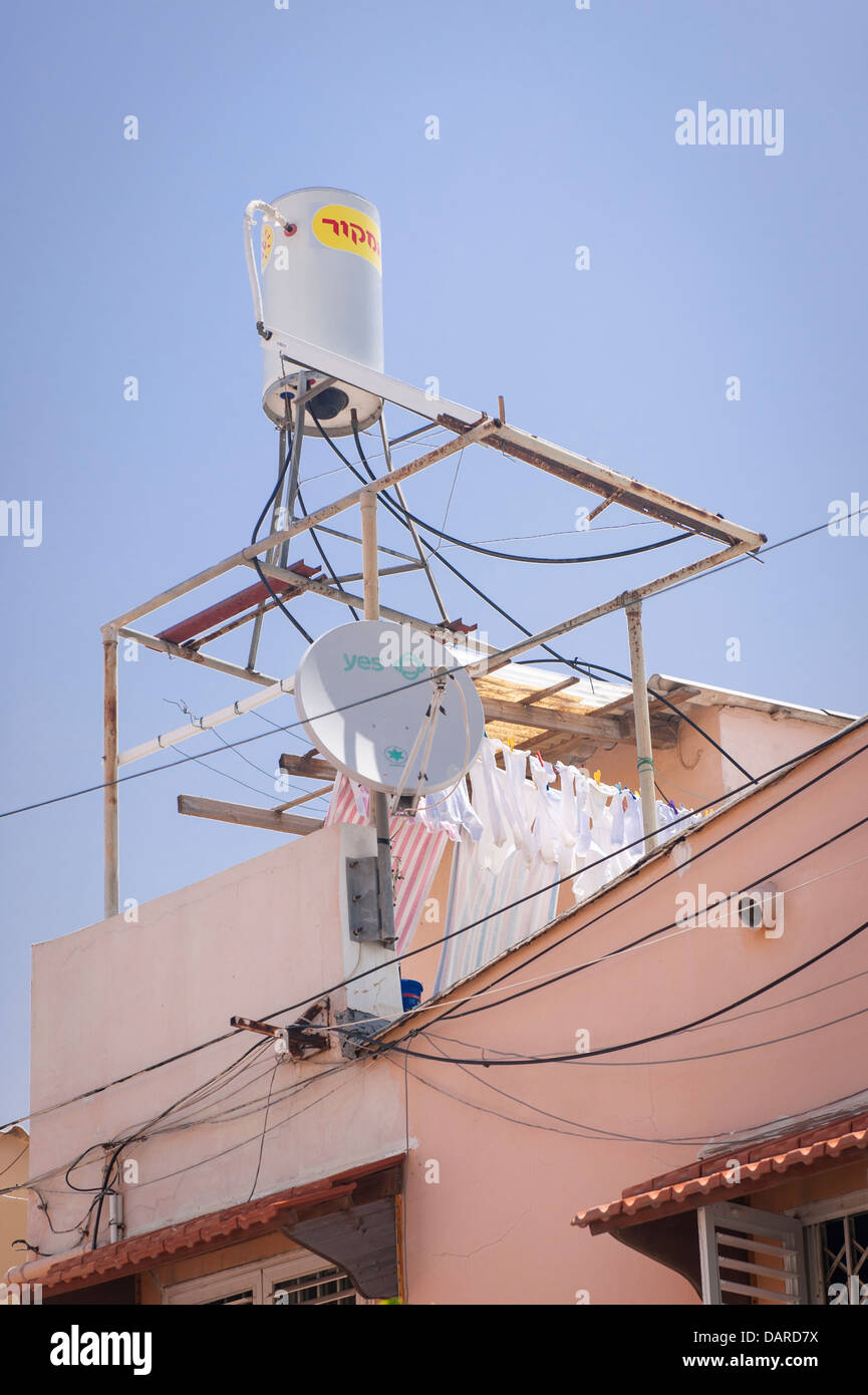 Israel Tel Aviv old town typical domestic roof scene solar panel & hot