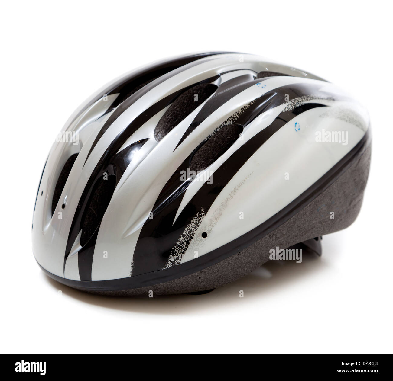 A gray and black bicycle helmet on a white background Stock Photo