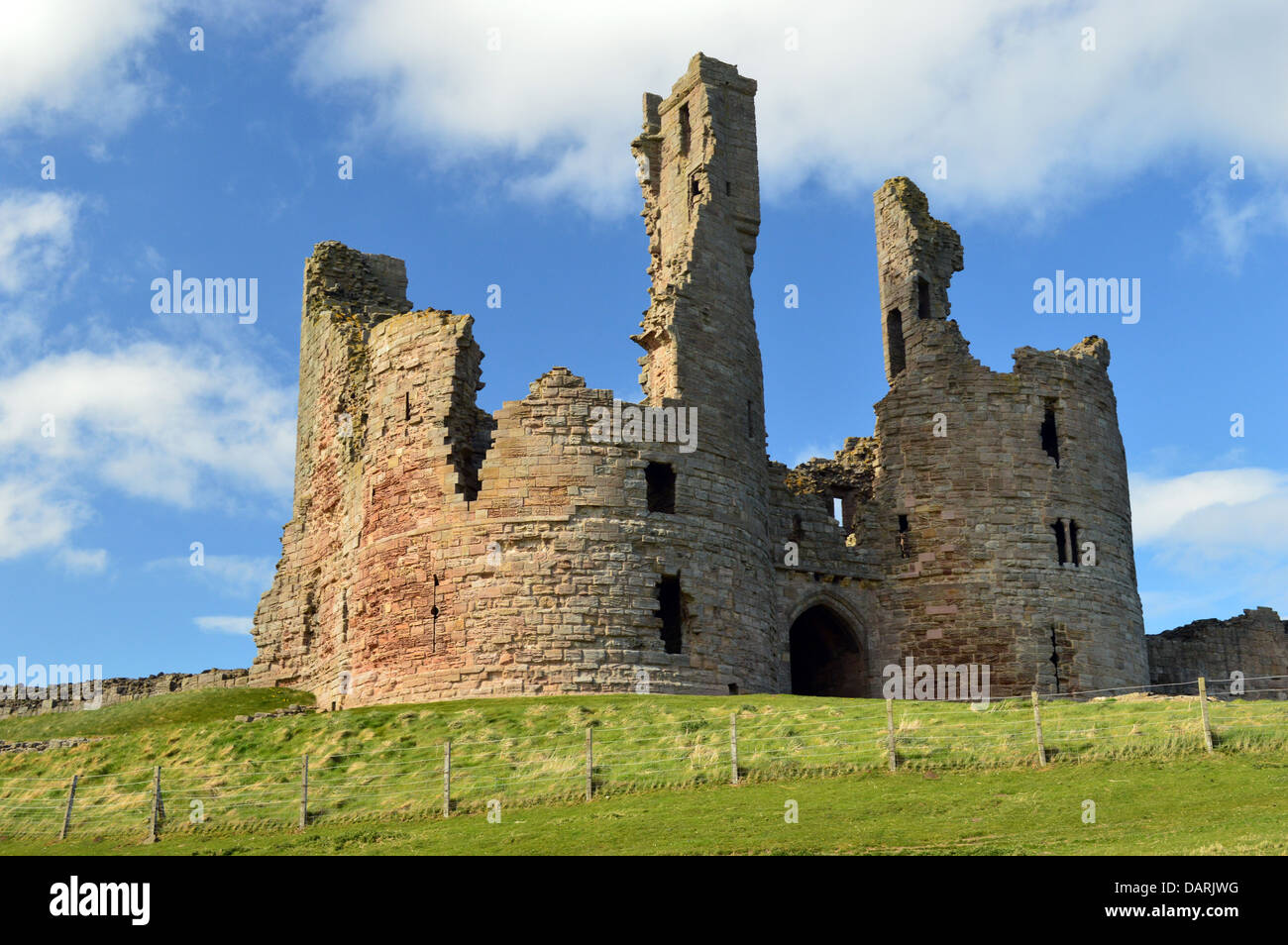 The Gatehouse to the Ruins of Dunstanburgh Castle on St Oswalds Way Long Distance Footpath Northumberland Coast Stock Photo