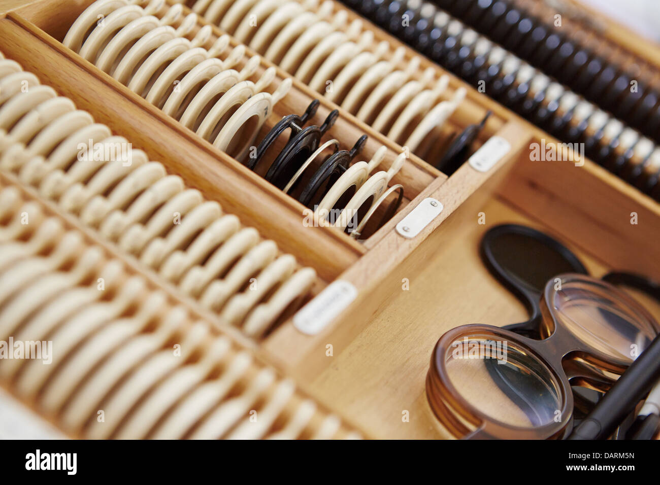Glasses box of an optician with many different trial lenses Stock Photo