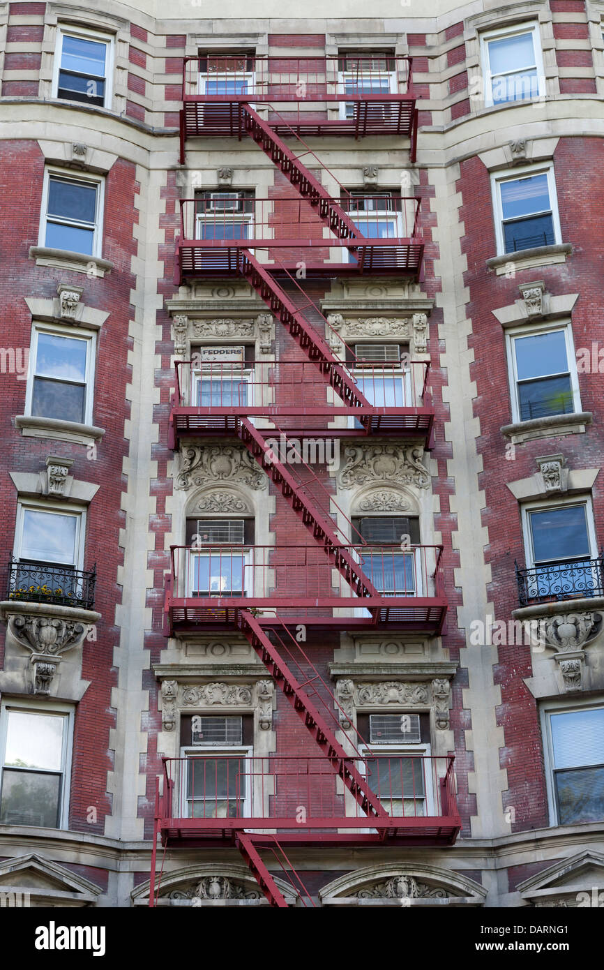 Colorful apartment buildings with fire escapes in New York City Stock ...