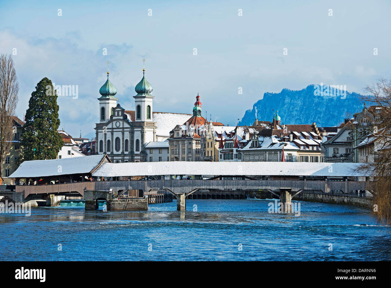 Europe, Switzerland, Lucerne, Spreuerbrucke, covered wooden bridge over the River Reuss, Jesuit church; Stock Photo