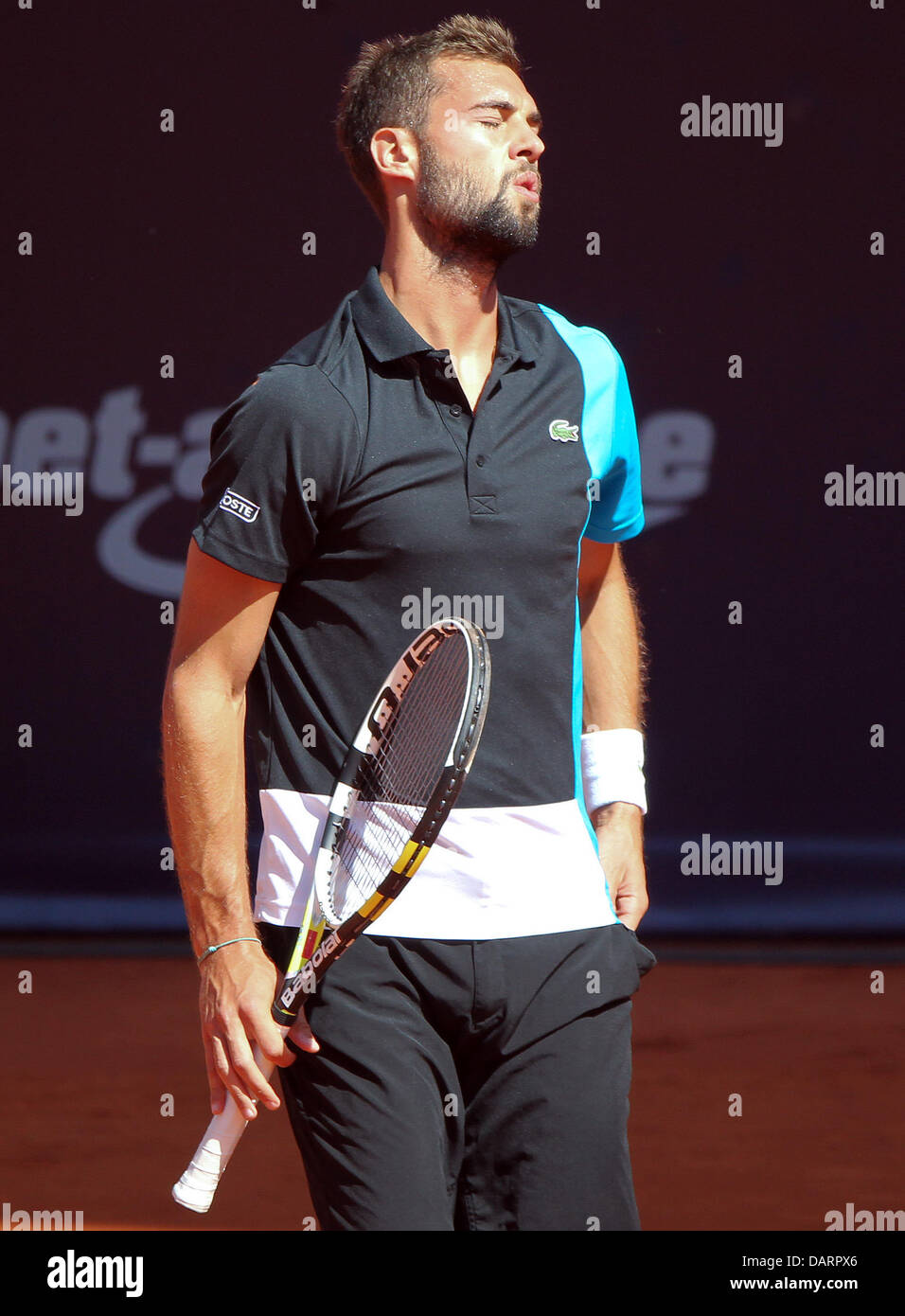 Hamburg, Germany. 18th July, 2013. Benoit Paire of France reacts in the round of 16 match against Monaco of Argetina during the ATP tournament in Hamburg, Germany, 18 July 2013. Photo: AXEL HEIMKEN/dpa/Alamy Live News Stock Photo