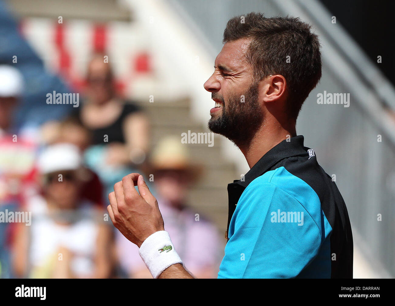 Hamburg, Germany. 18th July, 2013. Benoit Paire of France reacts in the round of 16 match against Monaco of Argetina during the ATP tournament in Hamburg, Germany, 18 July 2013. Photo: AXEL HEIMKEN/dpa/Alamy Live News Stock Photo
