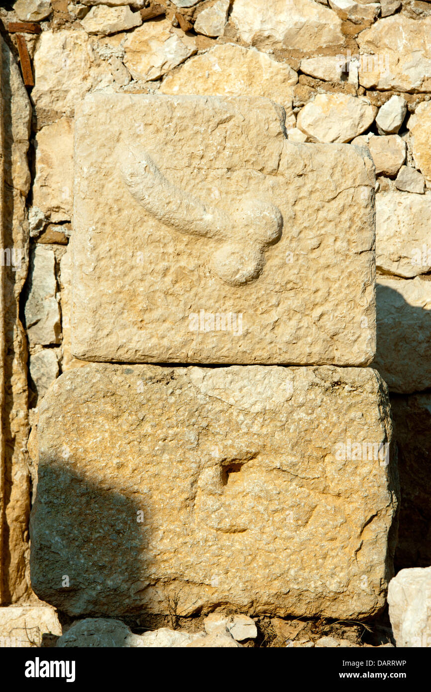 Asien, Türkei, Provinz Antalya, Patara, Phallussymbol, Relief an einem Stein an der Hauptstrasse Stock Photo