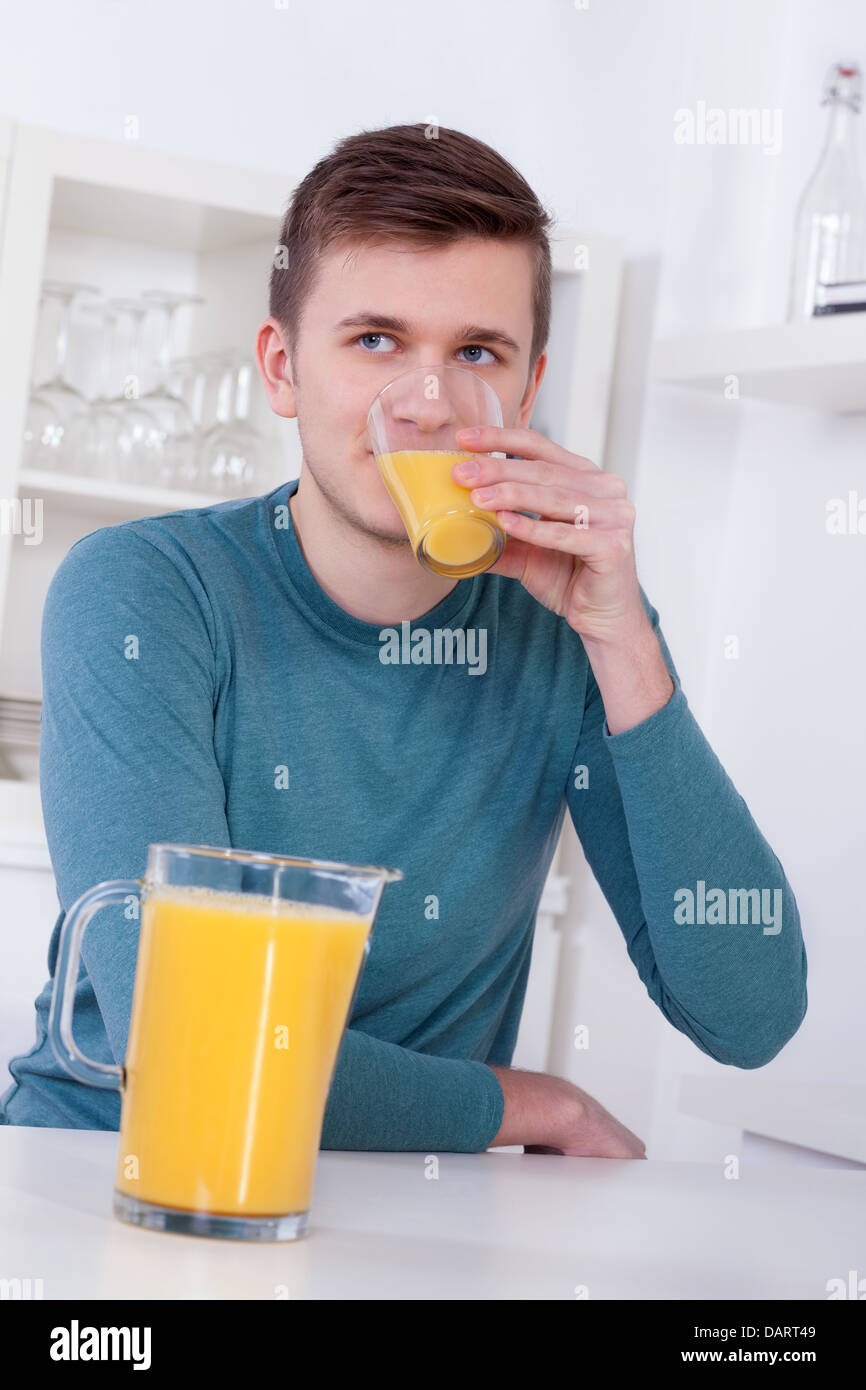 Boy drinking fresh orange juice hires stock photography and images Alamy
