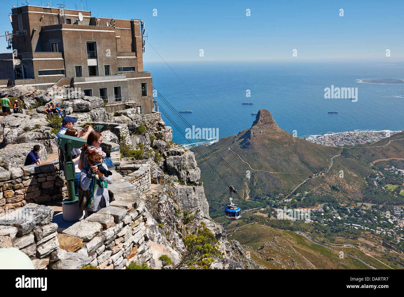 view from Table Mountain onto Cape Town with lion head and cable car with upper station, Western Cape, South Africa Stock Photo