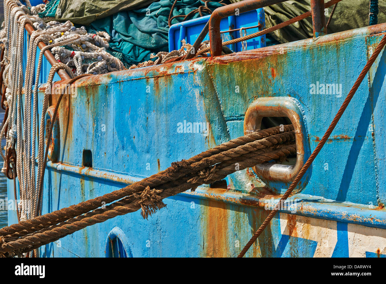 ropes and rusty detail of ship in harbour of Hout Bay, Cape Town