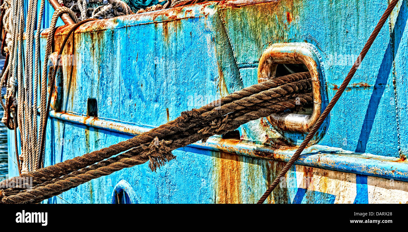 ropes and rusty detail of ship in harbour of Hout Bay, Cape Town