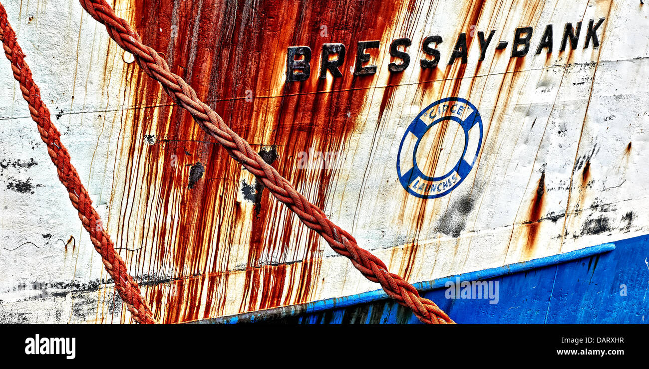 ropes and rusty detail of ship in harbour of Hout Bay, Cape Town