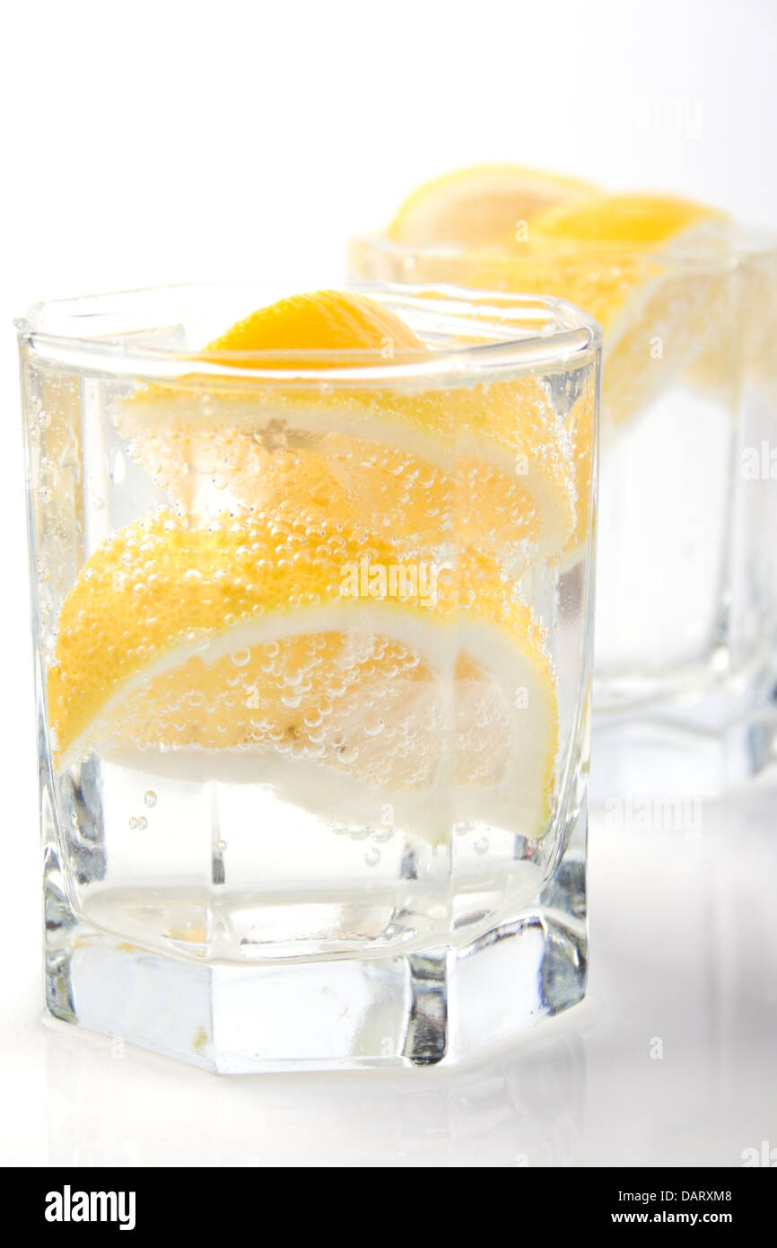 glasses with soda water and lemon Stock Photo Alamy