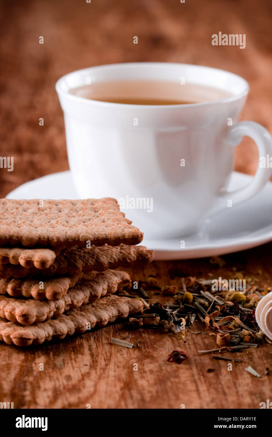cup of fresh herbal tea and some cookies Stock Photo - Alamy