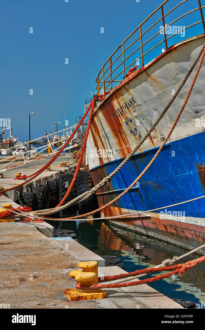 ropes and rusty detail of ship in harbour of Hout Bay, Cape Town