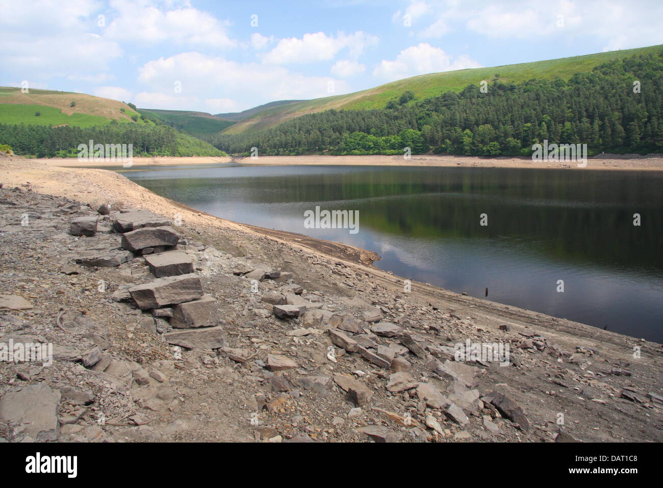 Peak district, Derbyshire, UK. 18th July 2013. Figures on Severn Trent Water's web-page 'How much water have we got?' show that water storage levels in Howden Reservoir dropped from 72.7% on 1st July to 63.2% on 8th July 2013.  Latest figures, from 15th July, show storaage levels at 53.5%.  Next figures due 22/07/13.  Severn Trent Water's Derwent Valley coomprises three reservoirs: Howden, Upper Derwent and Ladybower. Credit:  Matthew Taylor/Alamy Live News Stock Photo