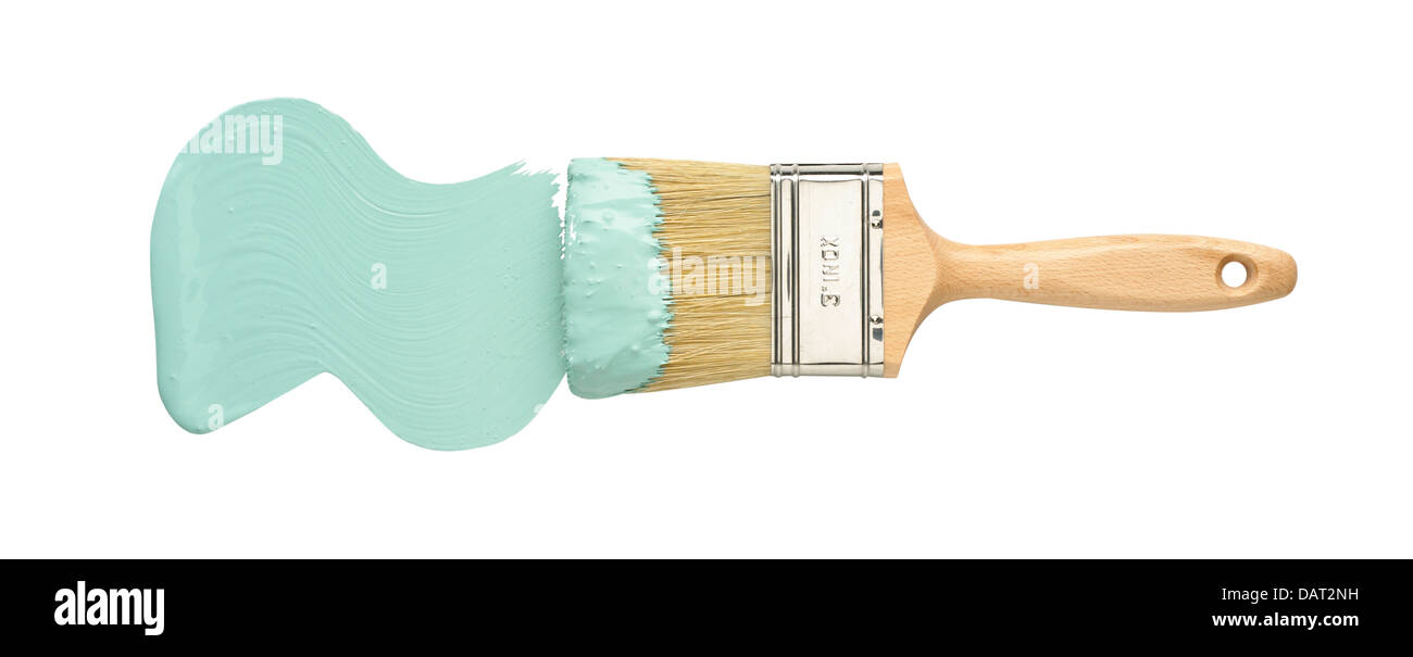 blue green paint and brush cut out onto a white background Stock Photo