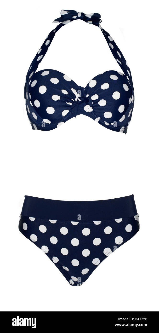 navy and white polka dot bikini cut out onto a white background Stock Photo