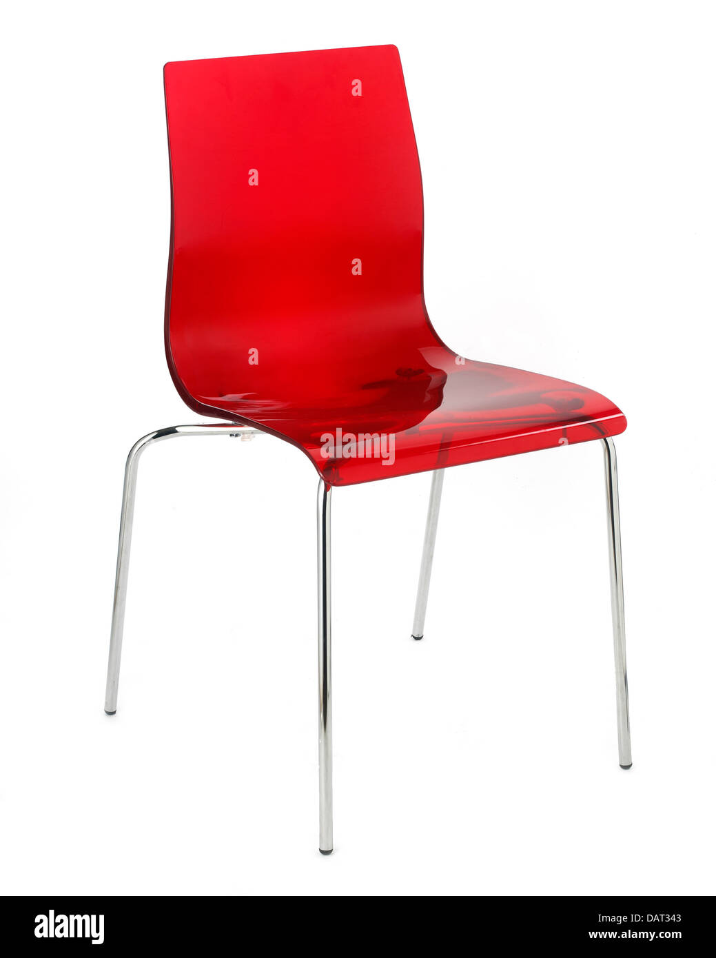 red plastic chair cut out onto a white background Stock Photo