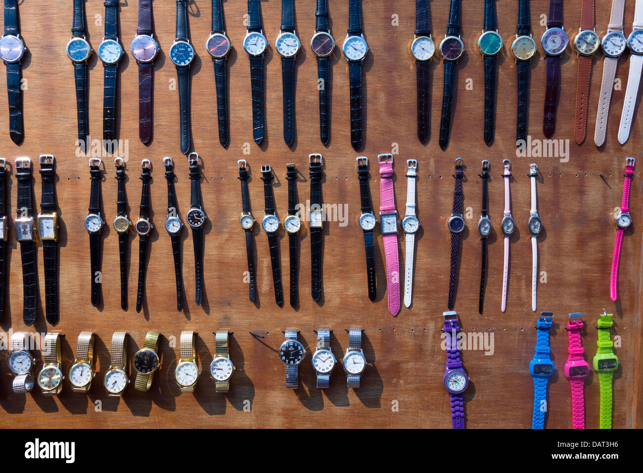 Watches hung on board for sale Stock Photo