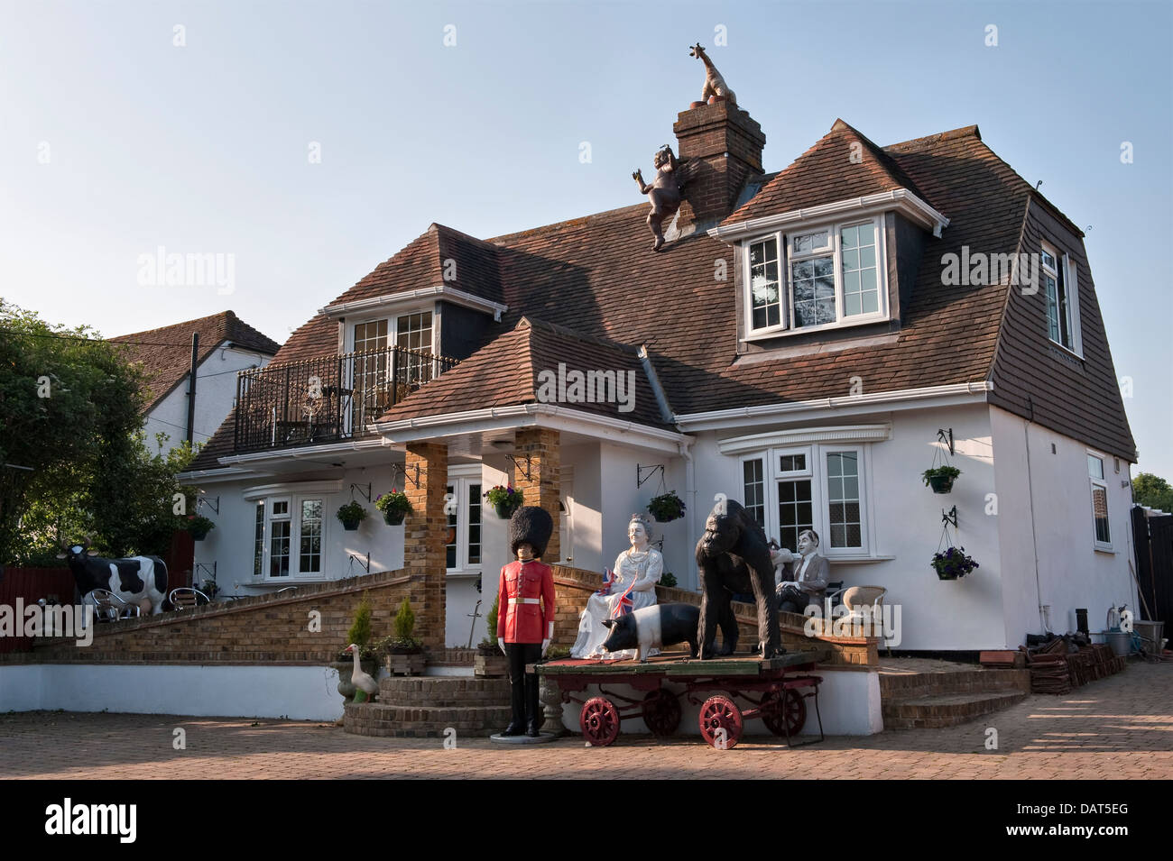 Eccentric garden sculptures outside a house in Lenham, Kent, UK Stock Photo Alamy