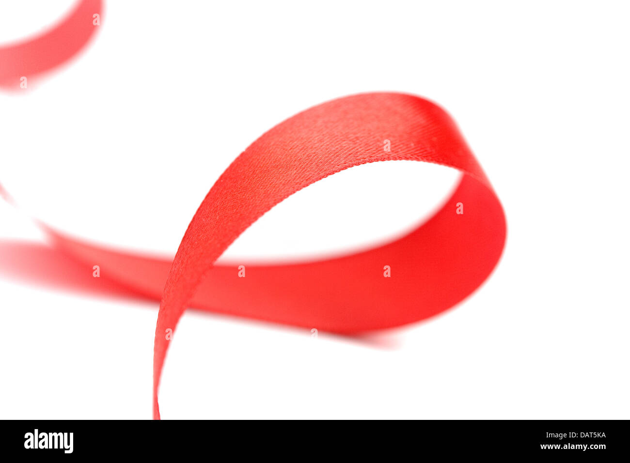 red satin ribbon Stock Photo - Alamy