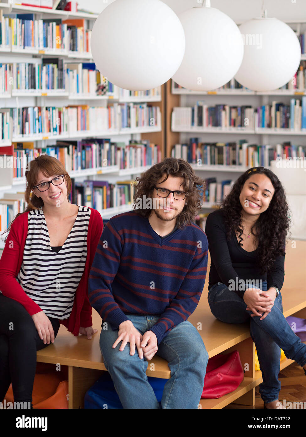 Group of multi ethnic people in library Stock Photo