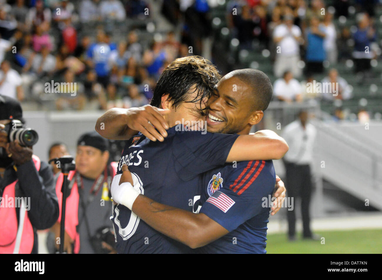 July 18, 2013 - Carson, California, USA - MLS-Major League Soccer-Chivas USA forward ERICK TORRES celebrates with team mate TRISTAN BOWEN after scoring the only goal of the match as Chivas USA defeats Toronto FC, 1 to 0, at the Home Depot Center, Carson, California, USA, July 17, 2013.   Early in the first half of play a Chivas USA player was ejected from the game which made the win even sweater for Chivas USA fans..Credit Image  cr  Scott Mitchell/ZUMA Press (Credit Image: © Scott Mitchell/ZUMAPRESS.com) Stock Photo