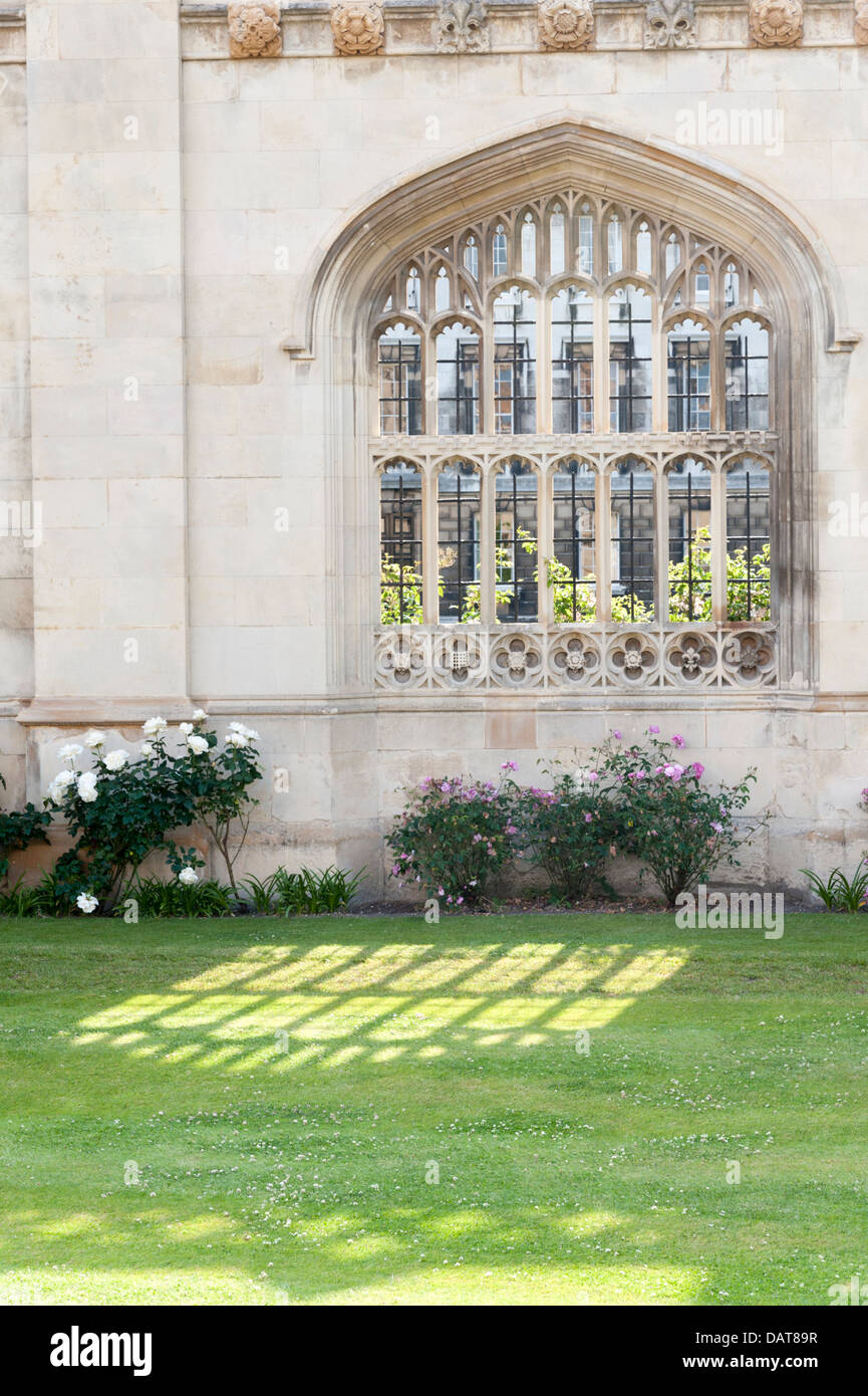 Sunlight streaming through an old stone window at King's College Cambridge UK Stock Photo