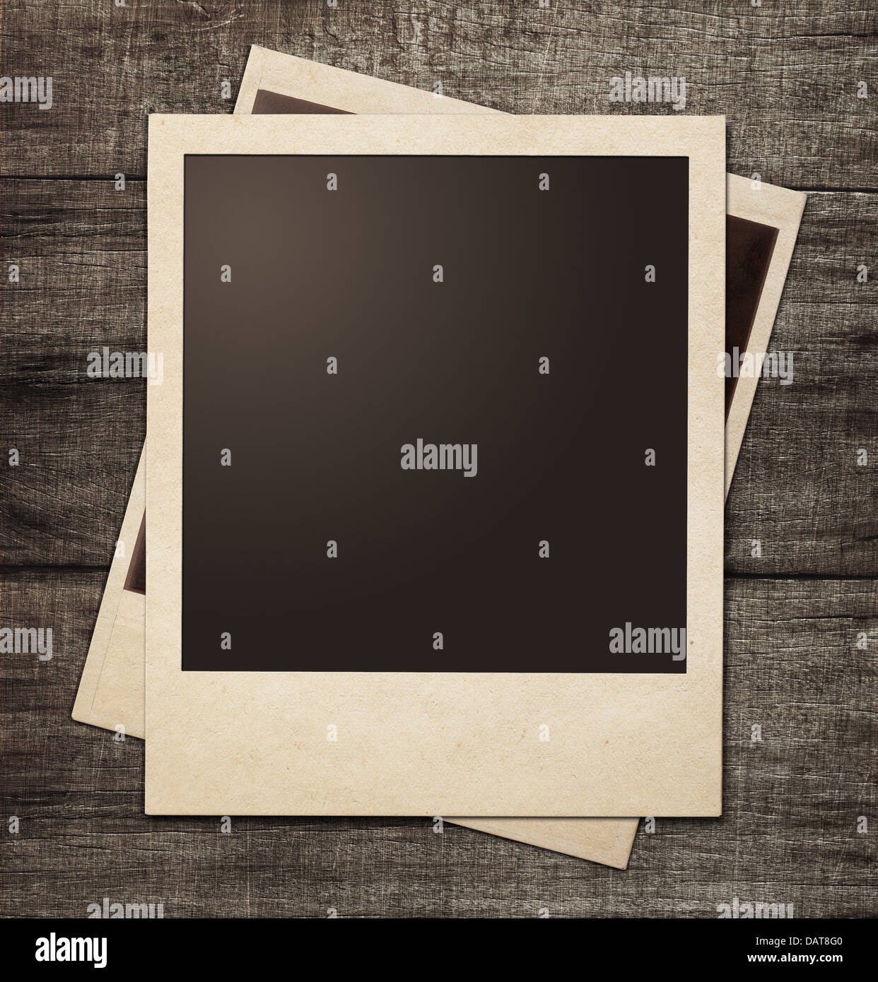 polaroid photo frames on wooden grunge background Stock Photo