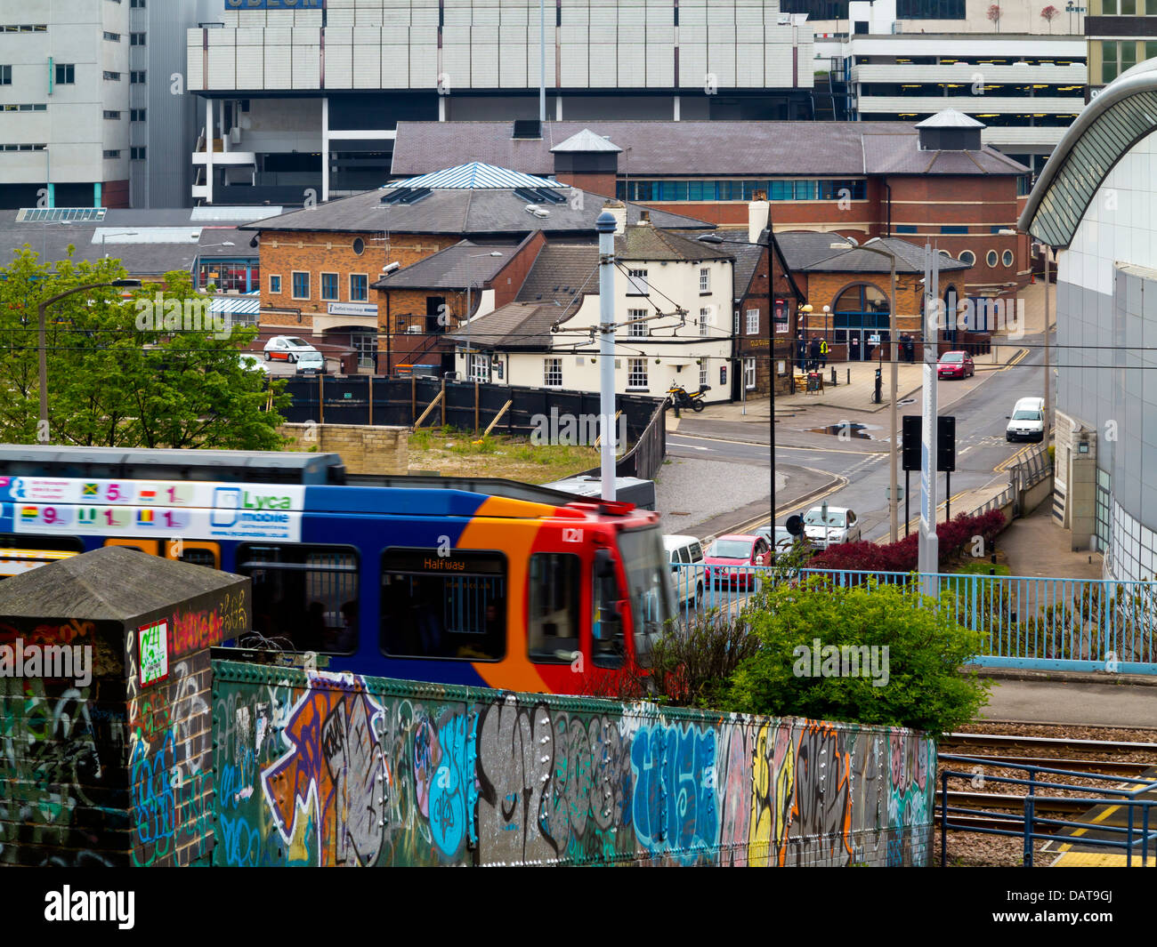 Tram and concrete buildings in Sheffield city centre South Yorkshire England UK Stock Photo