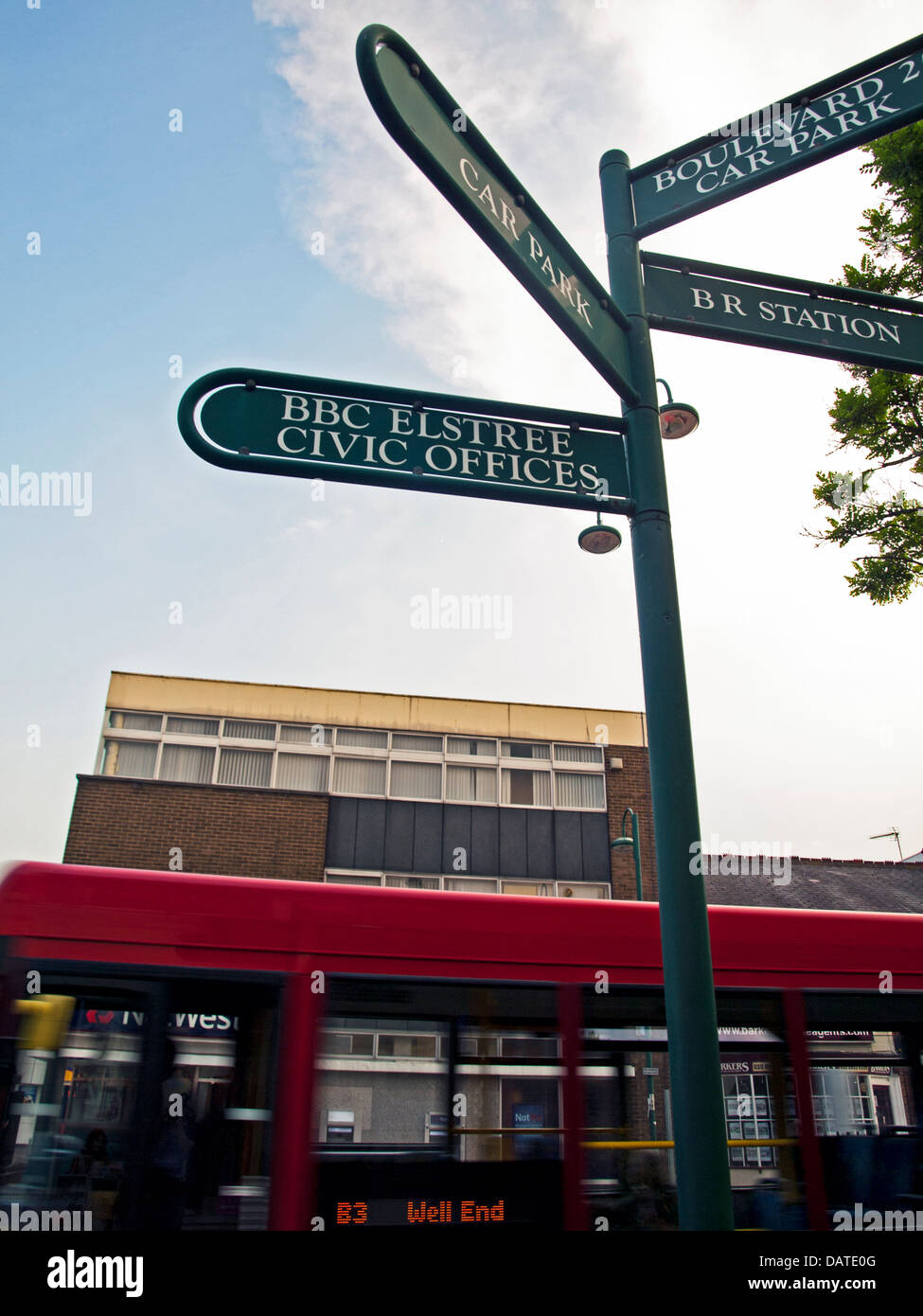 Street sign near Elstree Studios showing red bus, Borehamwood, Hertfordshire, England, United Kingdom Stock Photo