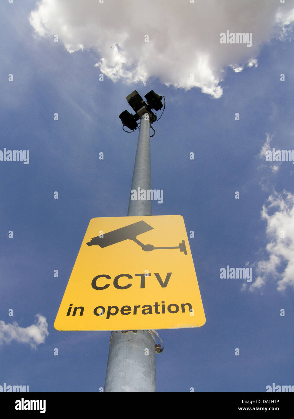 Cctv Sign And Camera On Pole Dramatic Blue Sky With Clouds Stock Photo Alamy